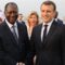 France’s President Emmanuel Macron (2ndR) is greeted by Ivory Coast’s